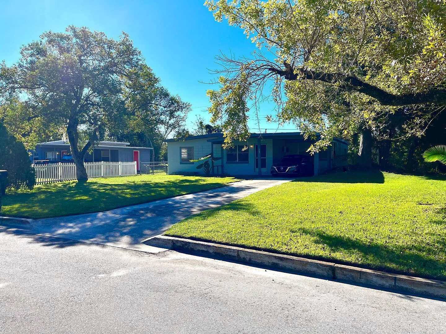Lawn Service included with this 2BR/1BA w/Carport, Office, and Bonus Room — Photo 1