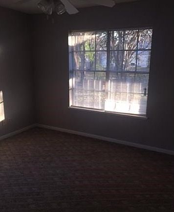 Bedroom 2 and 3 are very similar. Bedrooms still have carpeting.