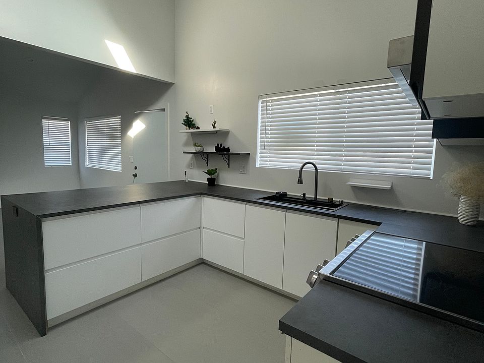 New tile flooring and kitchen cabinets.