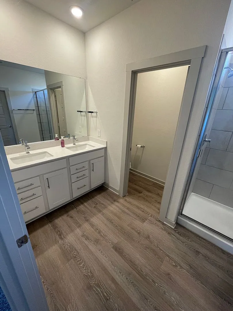 3 bed 2 bath home with attached garage and fenced in backyard built in 2023 — Photo 3