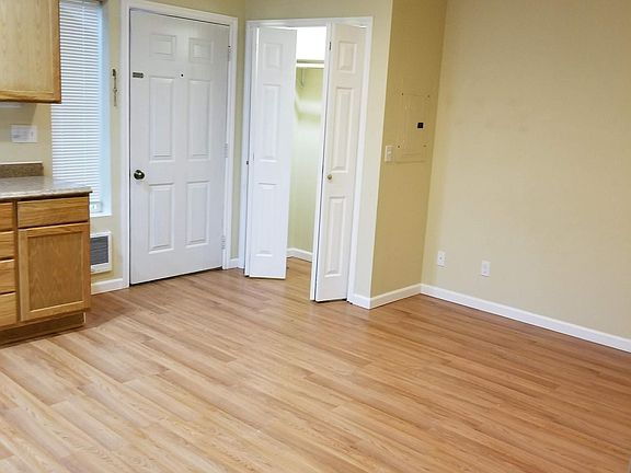 Living Room and Front Door with Coat Closet