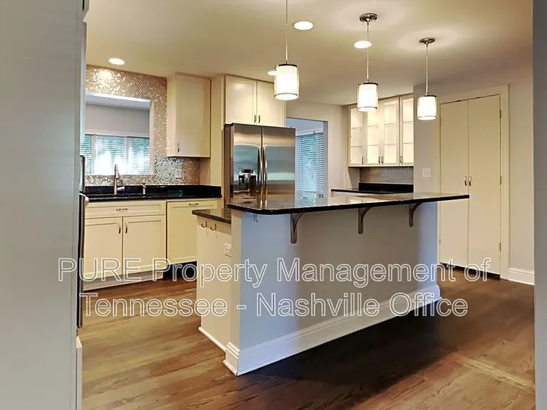 3818 Woodmont Ln — Photo 13