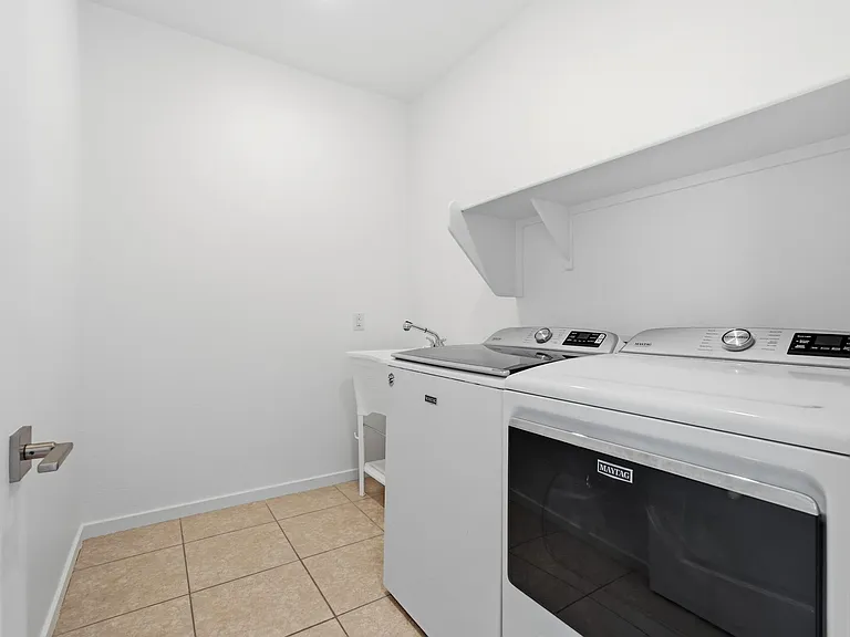 Laundry room with utility sink