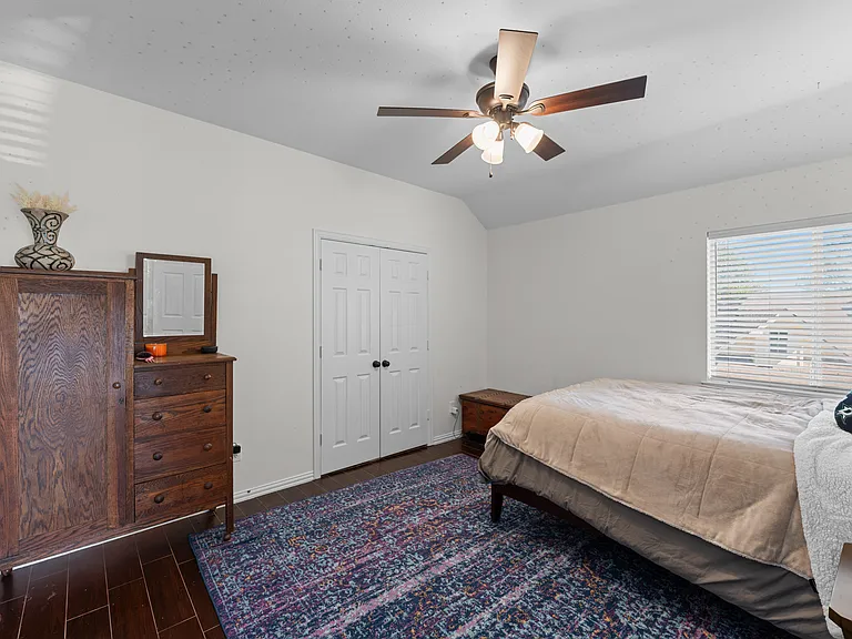 Comfortable queen bedroom with a peaceful setup.