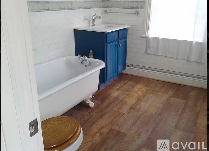 Remodeled bathroom, shower, and tub