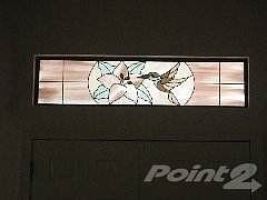 candlestone entry stained glass window