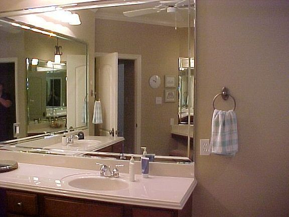 Large master bath with oversized mirrors, jacuzzi tub and shower