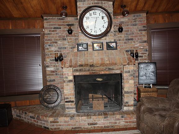 Living room w/wood burning fireplace