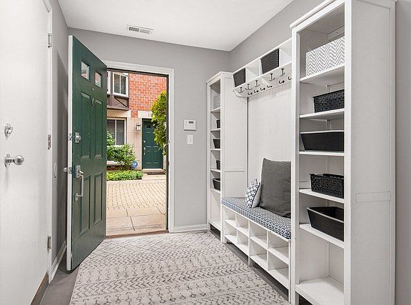 Welcome guests to your new home with a formal foyer & attached garage, perfect for wet & snowy boots