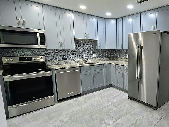 Kitchen with stainless steel appliances