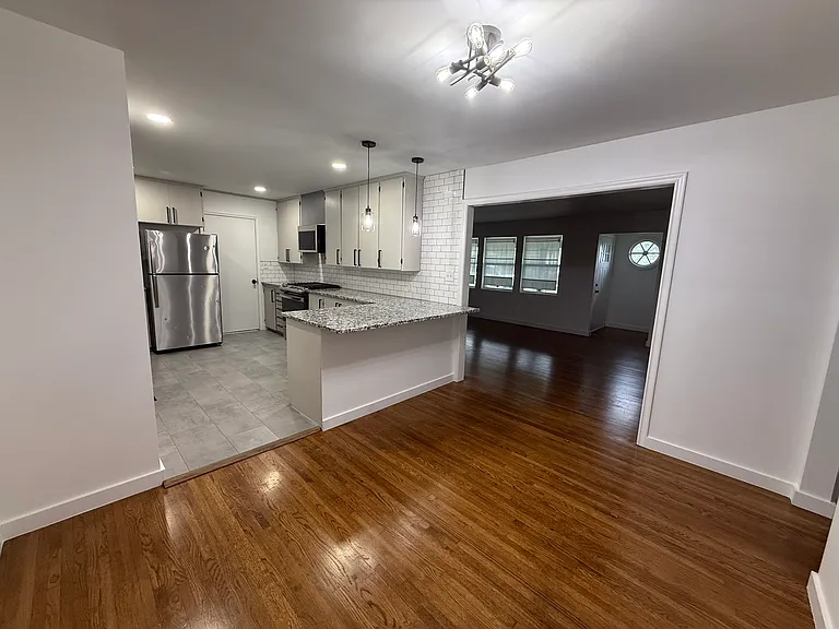 Dining area open to the kitchen, creating a seamless flow that's perfect for everyday living and entertaining.