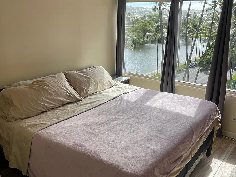Bedroom with Ca King Temperpedic mattress and custom built in cabinets /drawers