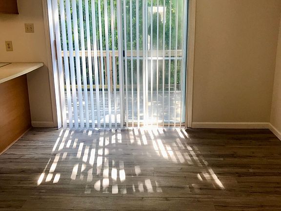 Bright eat in kitchen, overlooking trees
