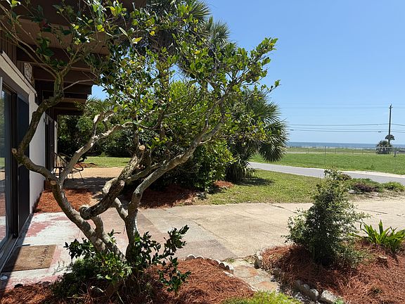Gulf views from a large private lot