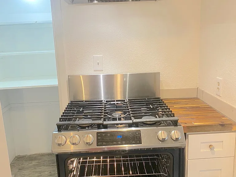 Five burner gas range.