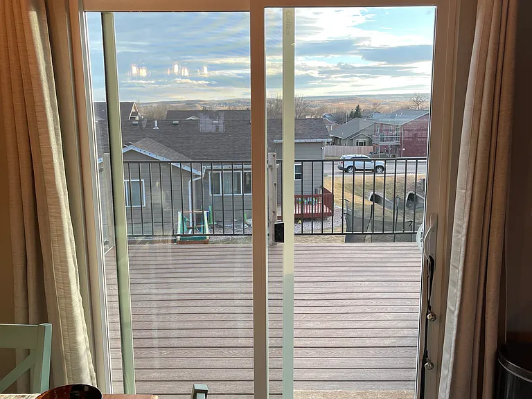 Walk out to deck from dining