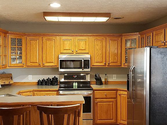 Kitchen with oak cabinets