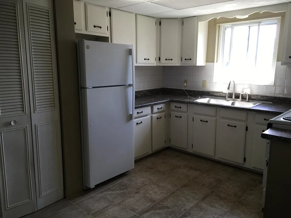 Kitchen with tiled floor