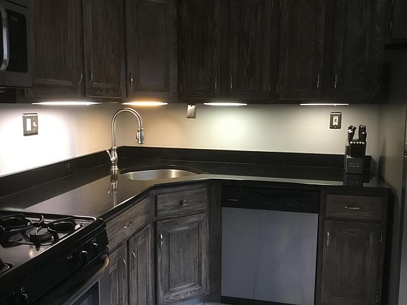 Large kitchen with a pantry and lots of natural sunlight