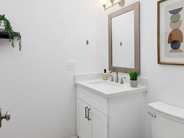 Bathroom 4 of 4 is a Hall/Powder Bathroom