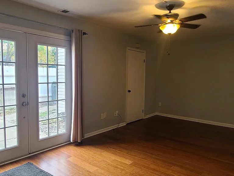 Den and dining room back of house