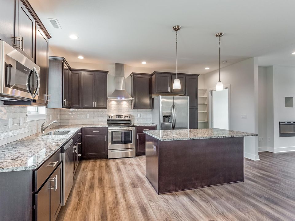 Granite countertops, stainless steel appliances