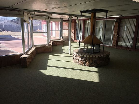 Sun room with fireplace