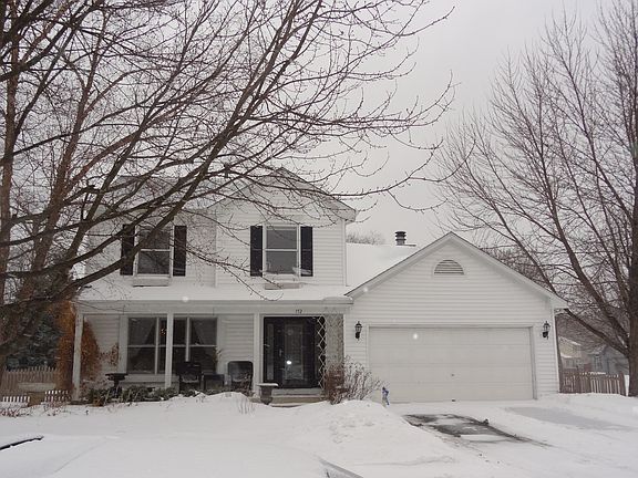 Great curb appeal with lush landscaping and a large, inviting front porch.