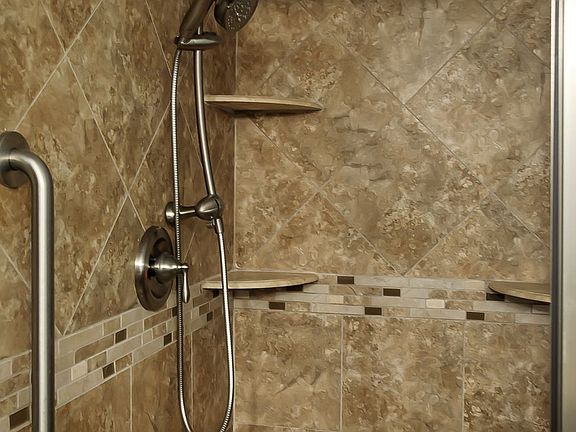 updated shower with grab bar