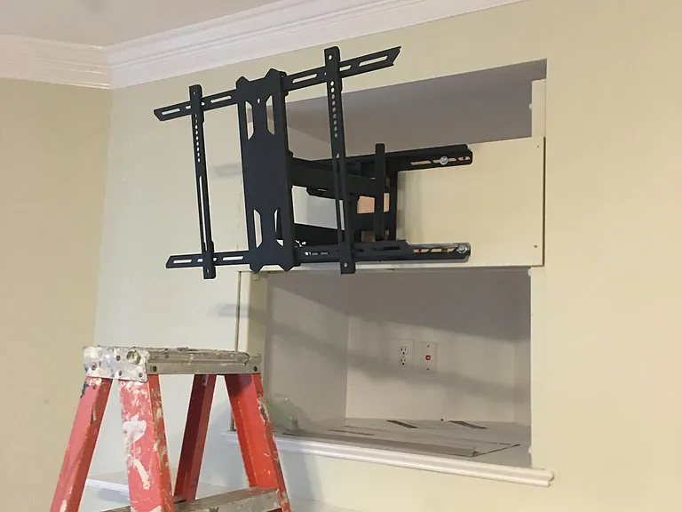 TV mount that is hidden behind mirror in previous picture.
