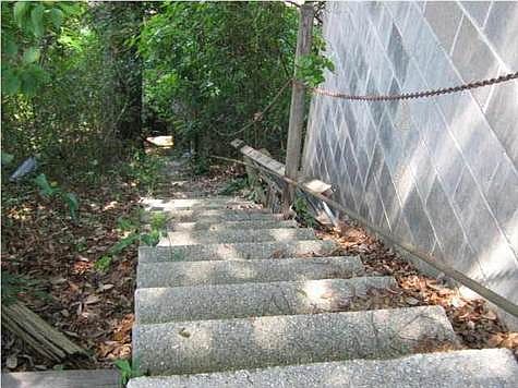 Stairs to old home place. No value given the home or garage