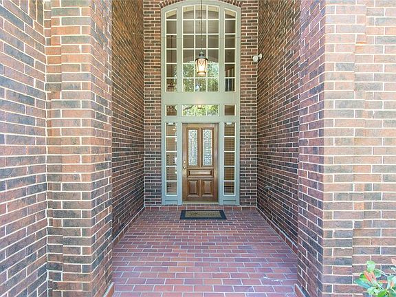Welcome home to 4203 Willow Bank Drive with this dramatic entry.