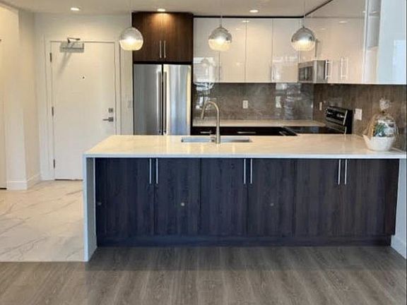 2nd image of 11703 Fraser St #203