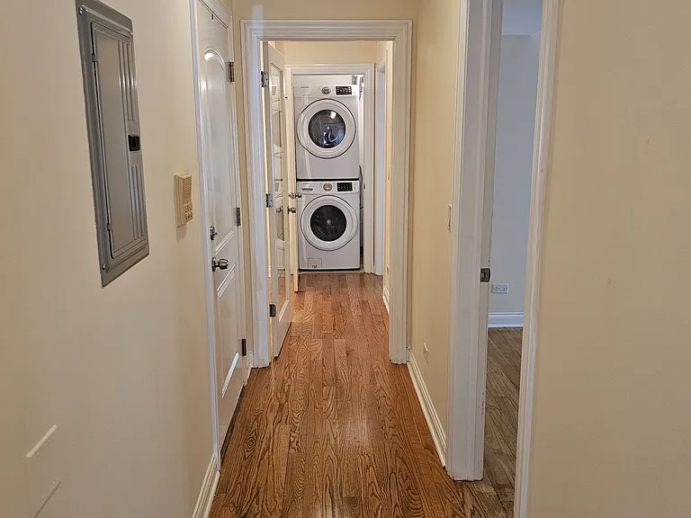 Hallway with in unit laundry