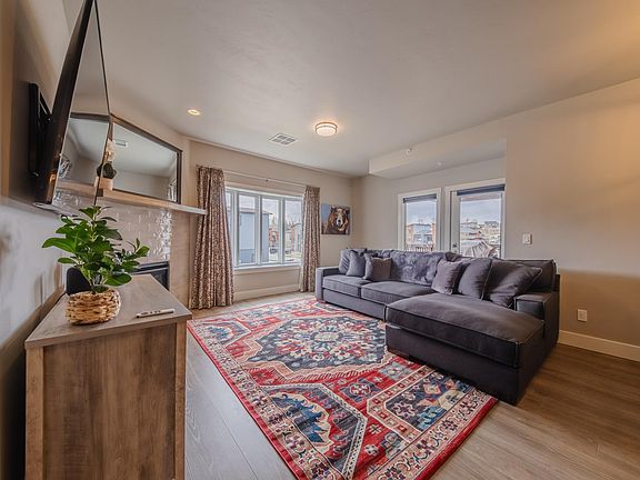Comfy Living Room & Door to the Deck.