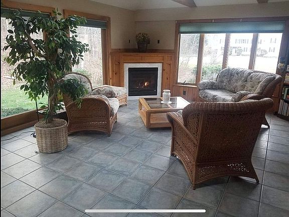Sunroom with fireplace
