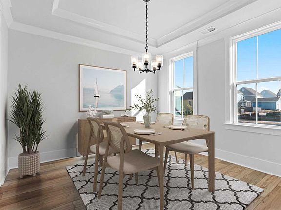 Dining Room. Model Home Representation.