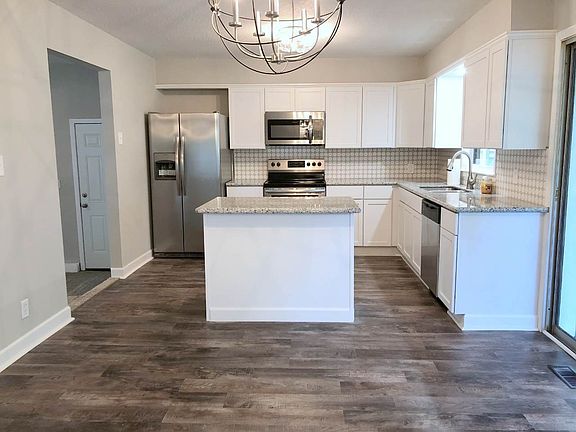 Kitchen with new cabinets, appliances and granite counter tops.