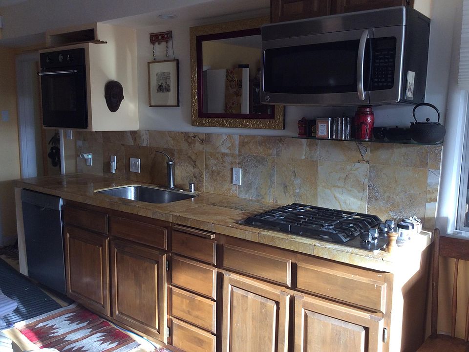 kitchen area, marble counters, dishwashers, etc.
