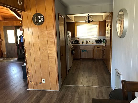 Kitchen has plenty of storage. Gas stove/oven, microwave, fridge