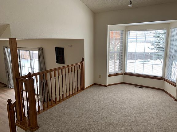 Dining room leading down to family room.