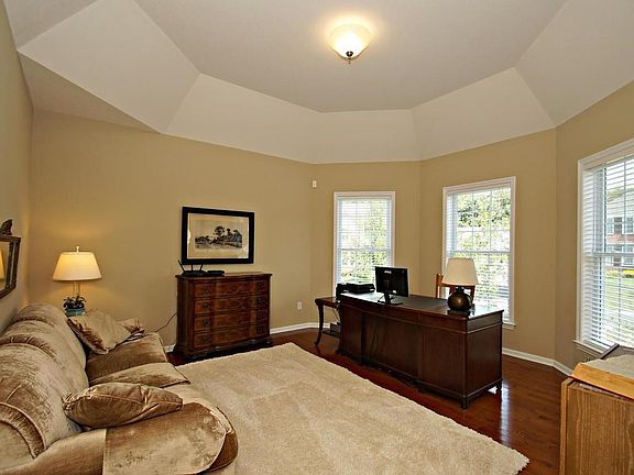 Just off the front entry, this office is ideal for getting some work done or would make a cozy spot to hangout.