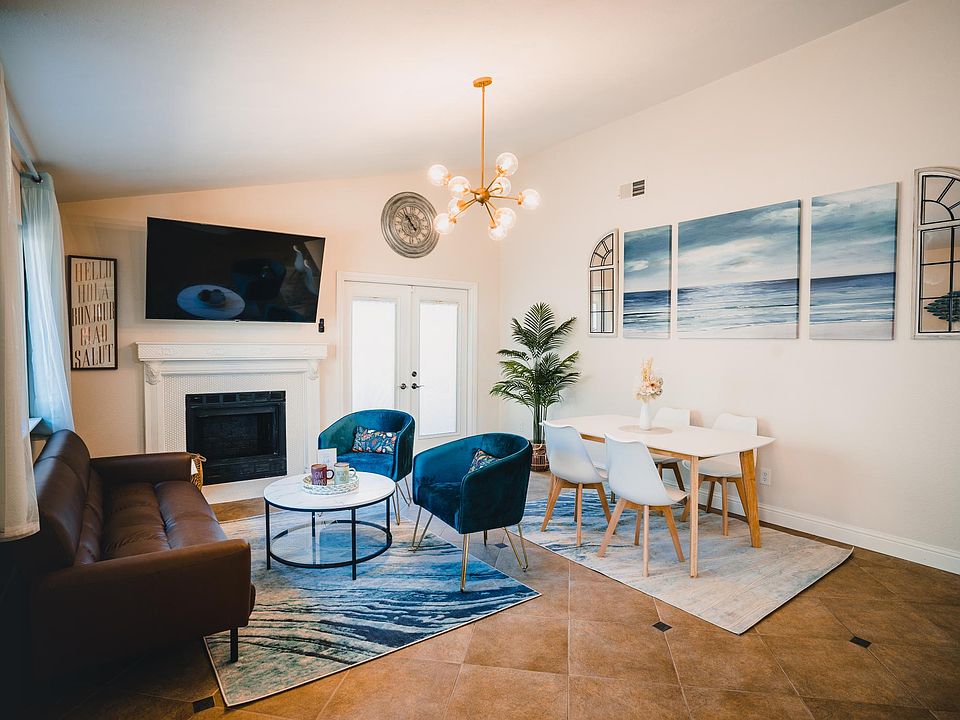 Open floorplan living and dining area for a cozy and comfortable gathering.