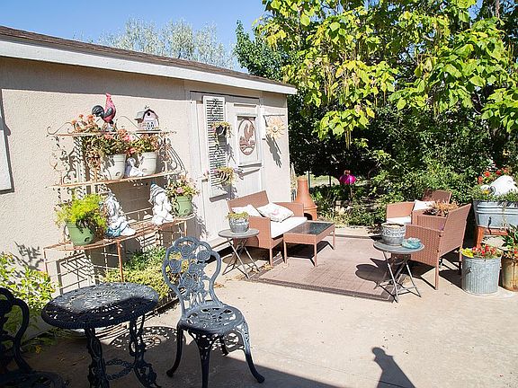 Back yard shed and patio are