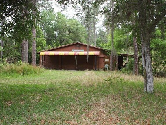 vacant land with Barn front view