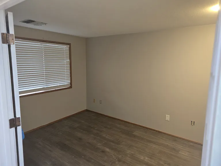 2bed is smaller and has dbl doors great for office or den