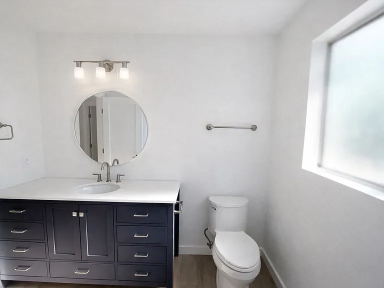 upstairs full bath, brand new vanity and toilet