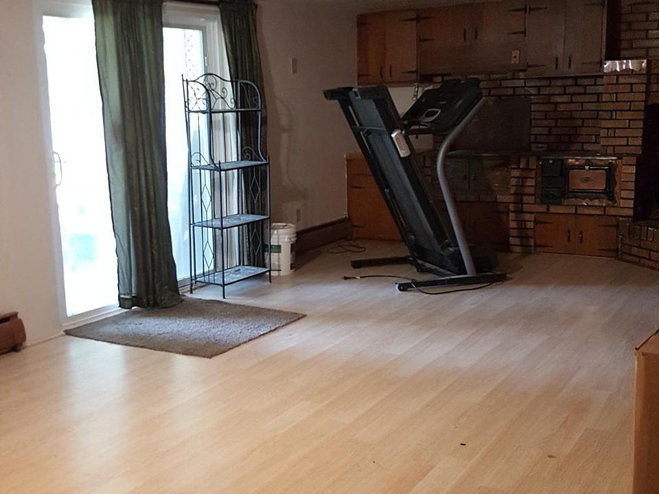 Off from the kitchen - dining or living room. Sliding glass door to the backyard