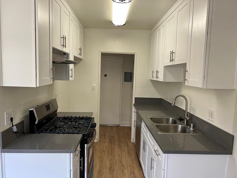 Brand new kitchen with stainless steel appliances
