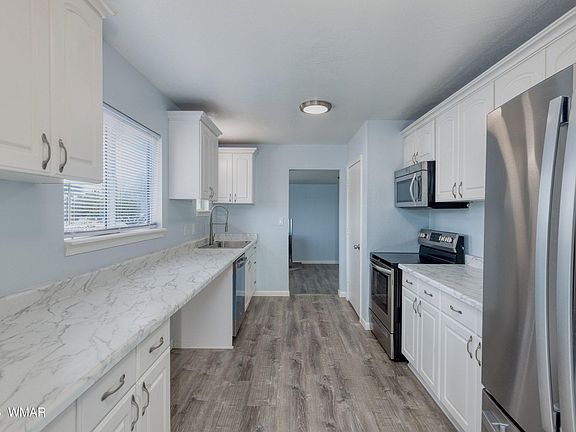 5th image of 1075 Rim View Dr